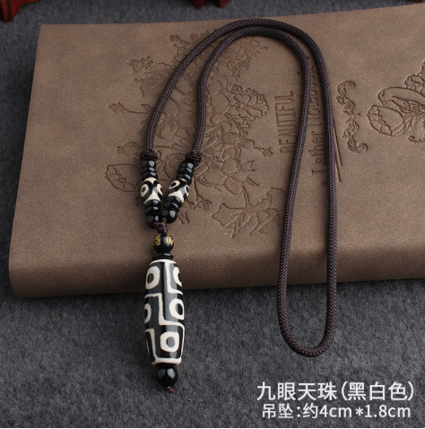 Black‑White 9‑Eye Tibetan Dzi Bead Pendant Necklace, Spiritual Talisman with Braided Cord